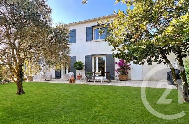 maison à vendre - 6 pièces - 133.0 m2 - MAUGUIO CARNON - 34 - LANGUEDOC-ROUSSILLON - Century 21 Granié Immobilier
